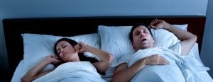 Snoring Man in Bed with Wife